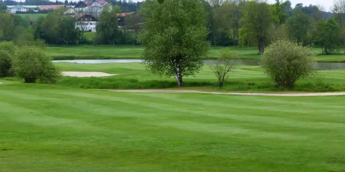 Fairway, bunkers and a pond at Golf & Country Club Gut Altentann near Salzburg
