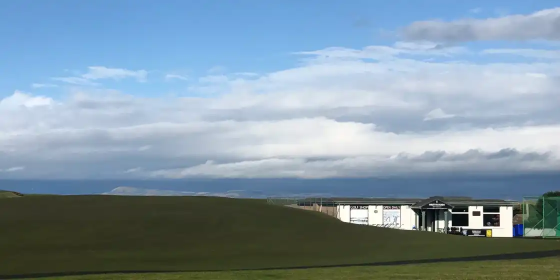 The opening ground of North Berwick's West Links and the golf shop beside the first tee