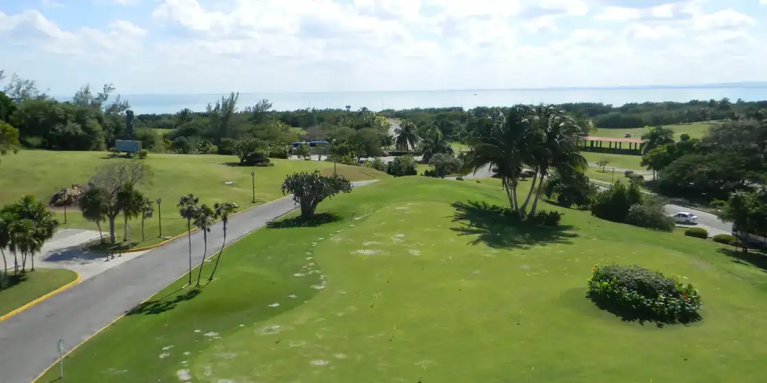 Palm-lined fairway beside the sea at Varadero Golf Club, Cuba
