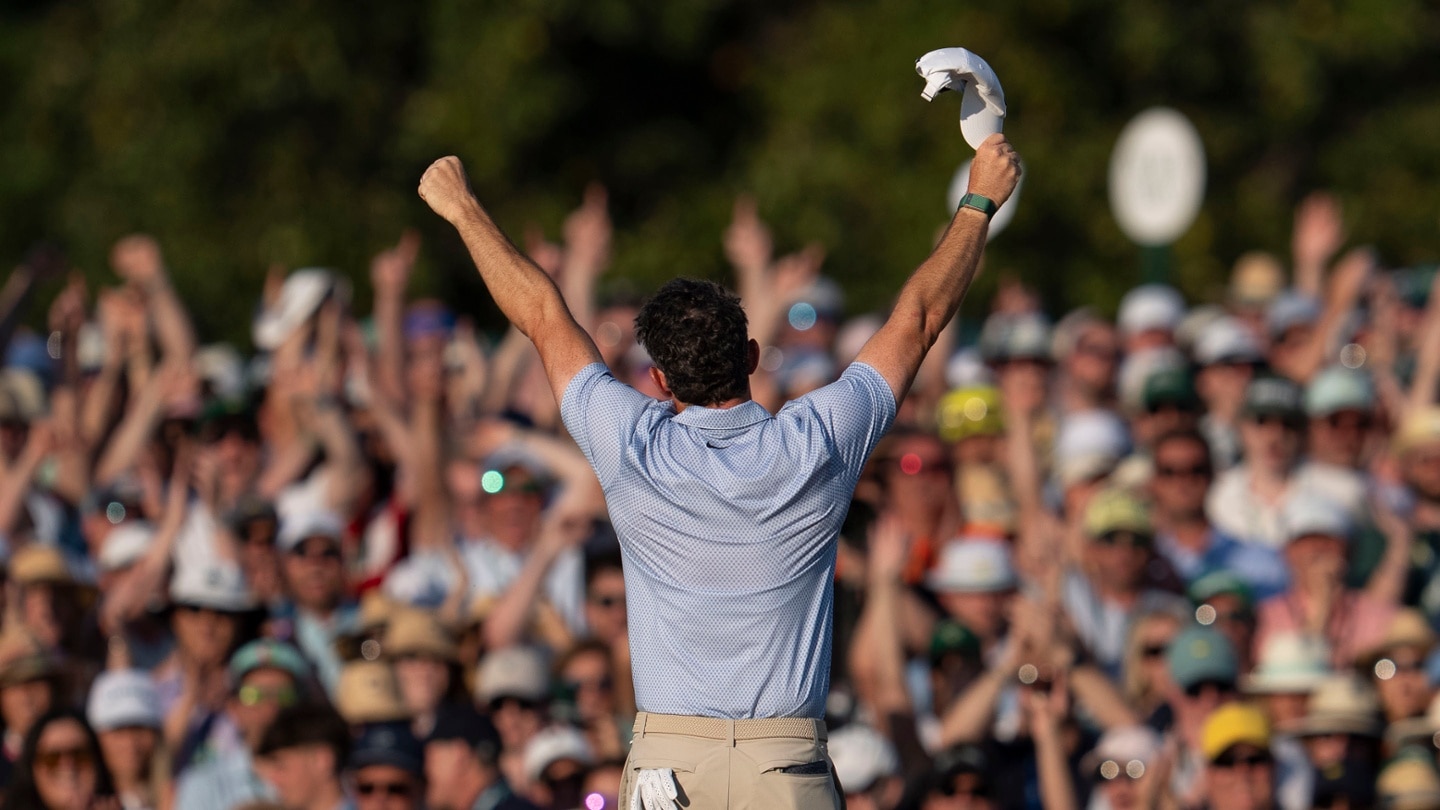 Masters tickets: champion celebrating with the green jacket at Augusta National