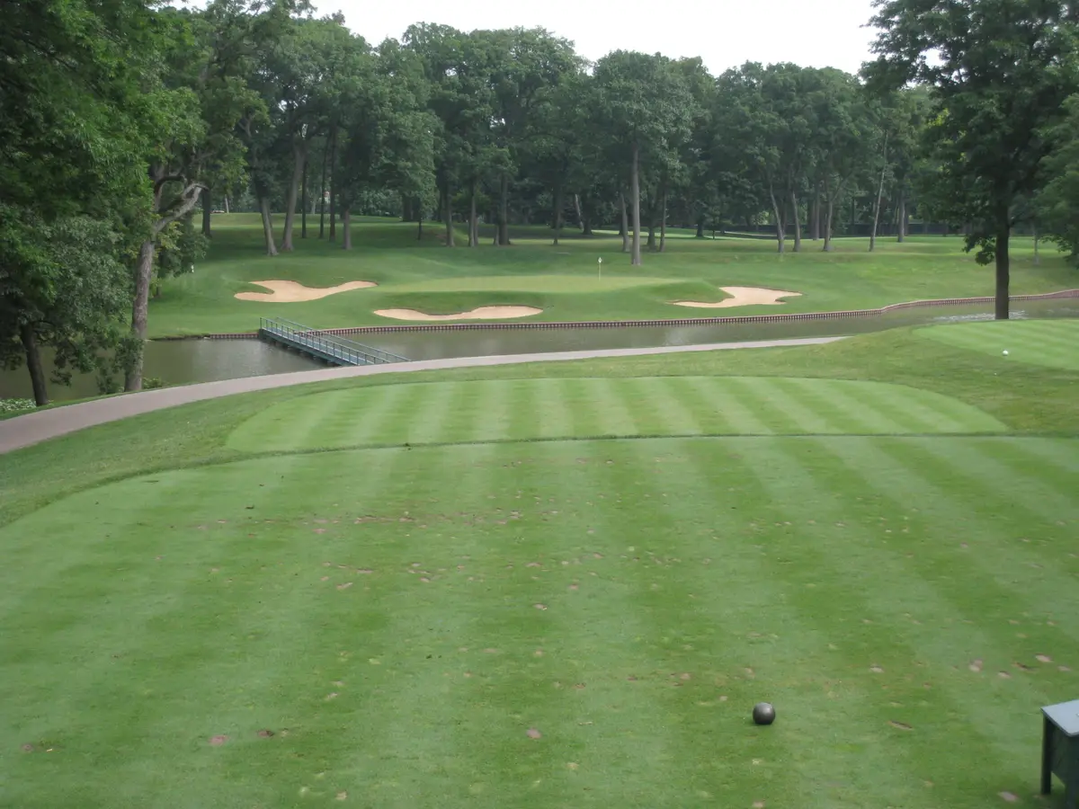 Tree-lined par-3 13th hole at Medinah No. 3 playing over Lake Kadijah, photographed before the OCM renovation